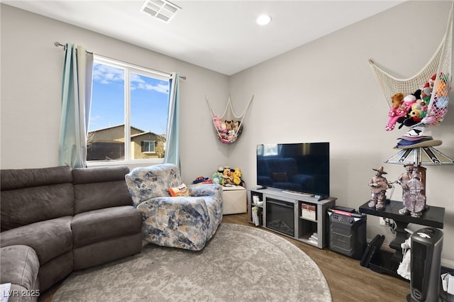 living room with hardwood / wood-style floors