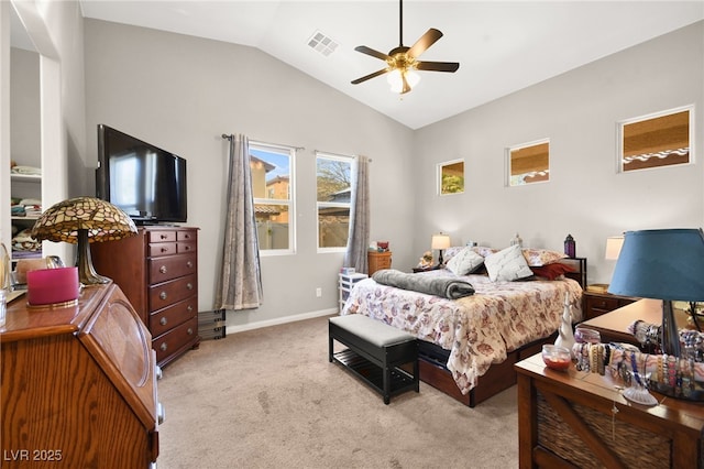 bedroom featuring ceiling fan, light carpet, and lofted ceiling