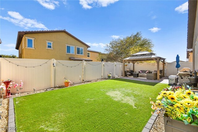 view of yard featuring a gazebo and an outdoor living space