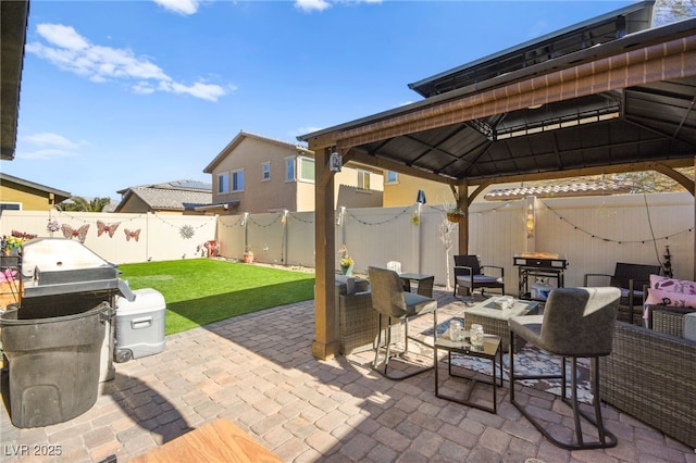 view of patio with a gazebo and a grill