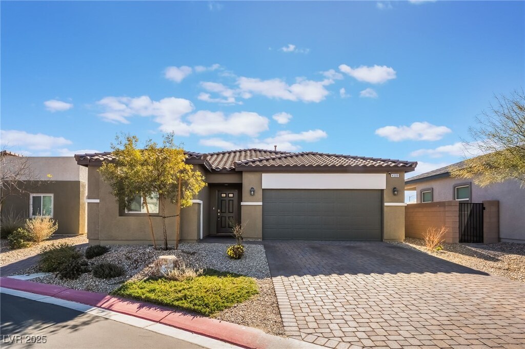 view of front of property with a garage