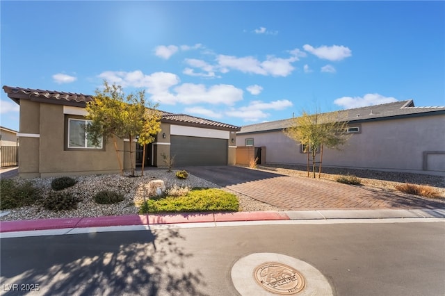 view of front of property featuring a garage