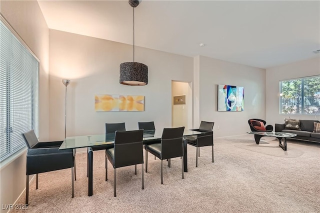 view of carpeted dining space