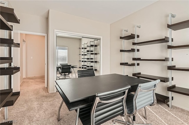 view of carpeted dining space