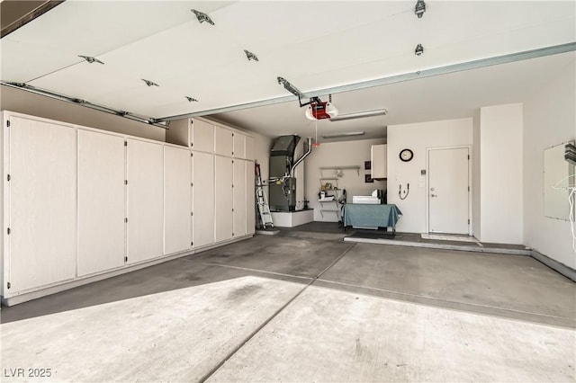 garage with heating unit and a garage door opener