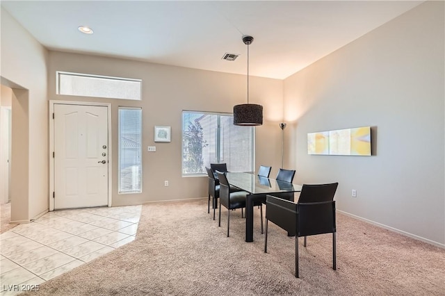 view of carpeted dining area