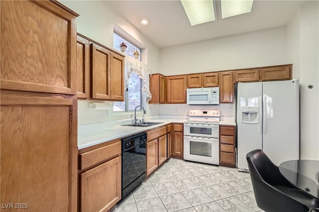 kitchen featuring sink, white appliances, and light tile patterned floors