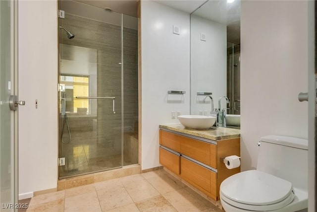 bathroom featuring walk in shower, vanity, toilet, and tile patterned flooring