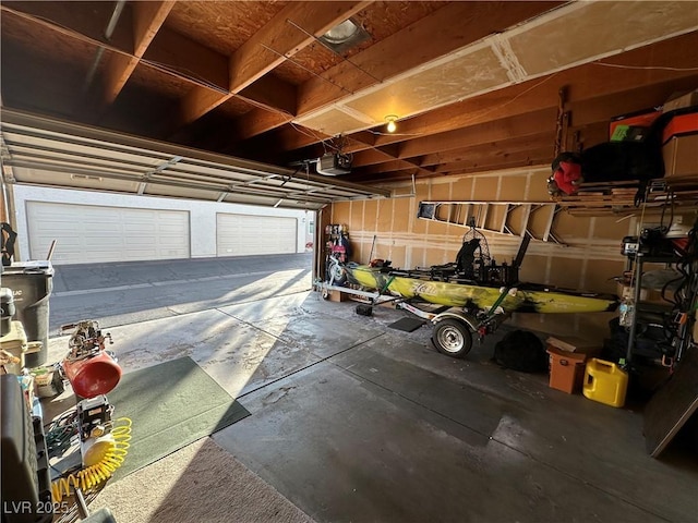 garage featuring a garage door opener