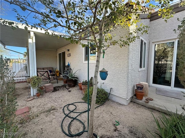 view of home's exterior with a patio