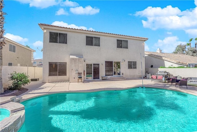 view of pool featuring a patio area