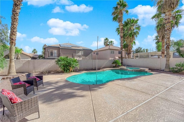 view of pool featuring an in ground hot tub and a patio