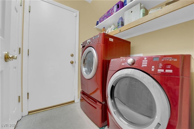 laundry area featuring washing machine and clothes dryer