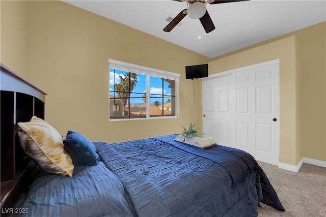 bedroom featuring carpet flooring, ceiling fan, and a closet