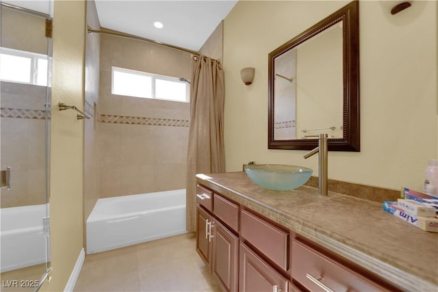 bathroom with vanity, tile patterned flooring, and shower / bath combo