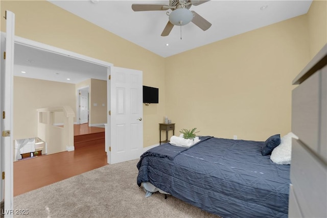 bedroom with ceiling fan and carpet flooring