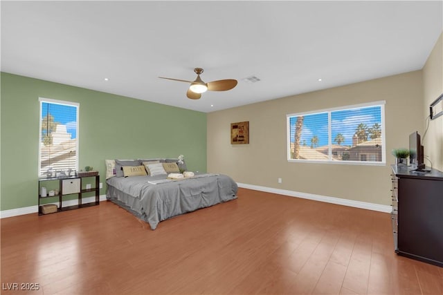 bedroom featuring ceiling fan and wood-type flooring