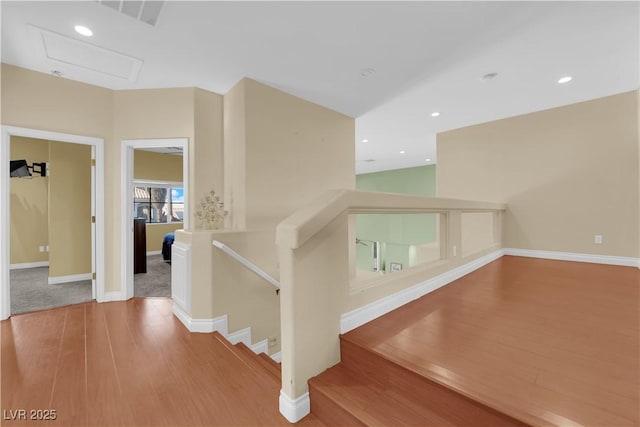 corridor featuring hardwood / wood-style floors