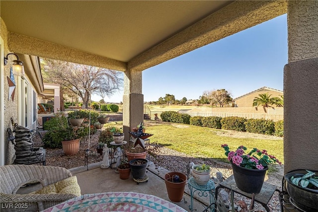 view of patio / terrace with a rural view