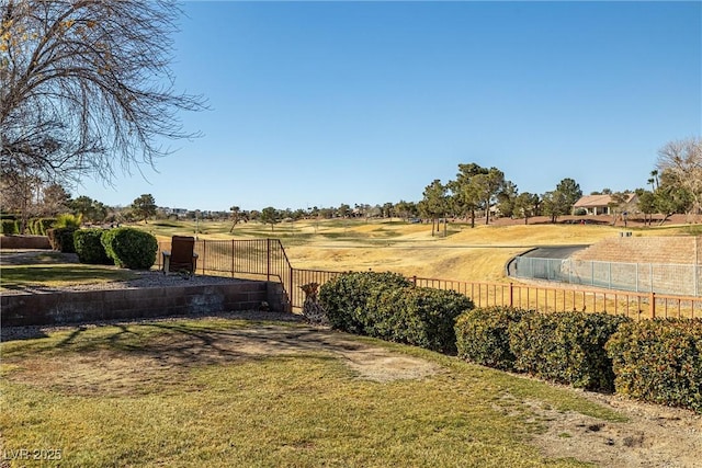 view of yard with a rural view