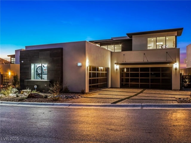 modern home featuring a garage