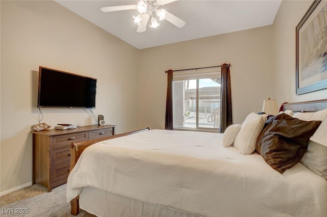 bedroom featuring light colored carpet and ceiling fan