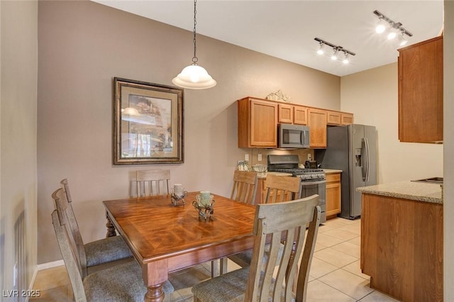 dining room with light tile patterned flooring