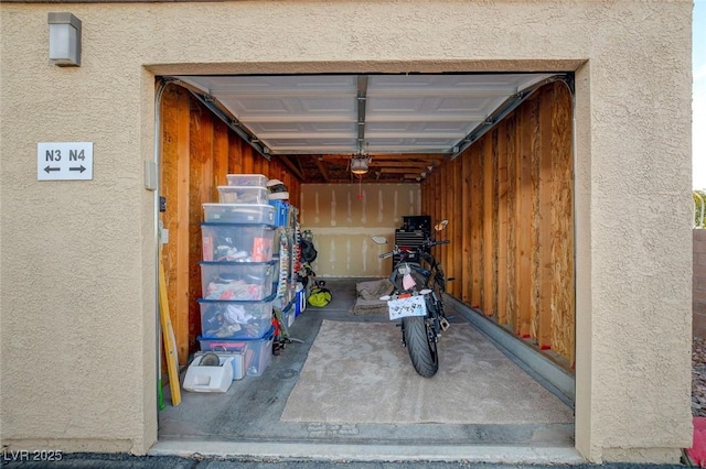 garage featuring a garage door opener