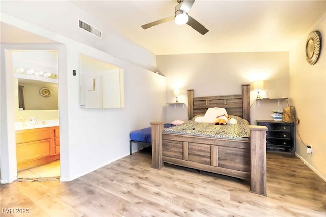 bedroom featuring sink, ceiling fan, connected bathroom, and wood-type flooring