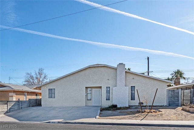 back of property with a patio