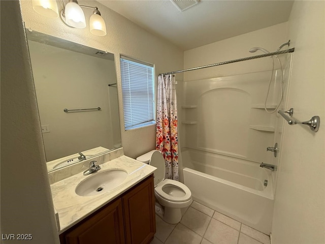 full bathroom featuring vanity, toilet, tile patterned floors, and shower / bath combo