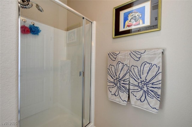 bathroom with an enclosed shower