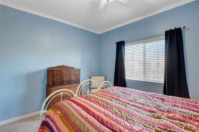 bedroom featuring crown molding, carpet floors, and ceiling fan