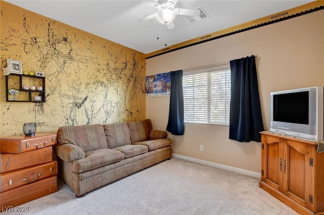 living room featuring ceiling fan and light carpet