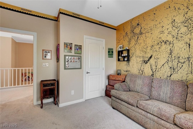 carpeted living room featuring crown molding