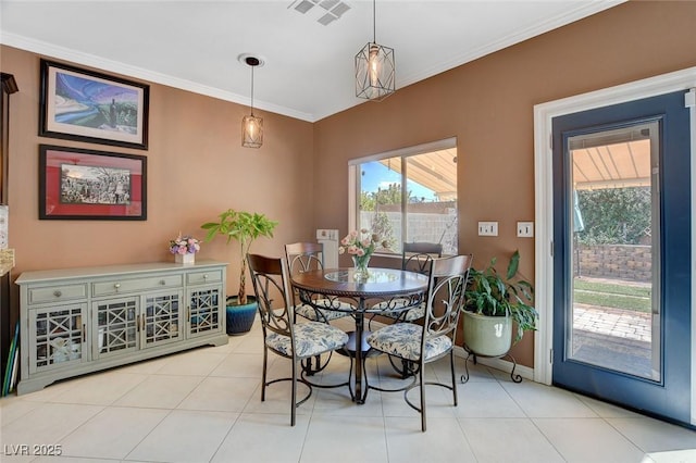 tiled dining area with ornamental molding