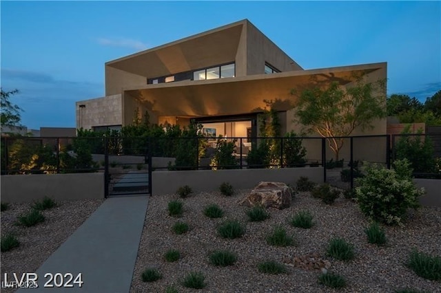 view of property exterior at dusk