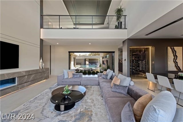 living room with a high ceiling