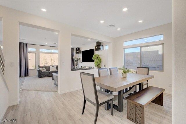 dining room featuring light hardwood / wood-style flooring