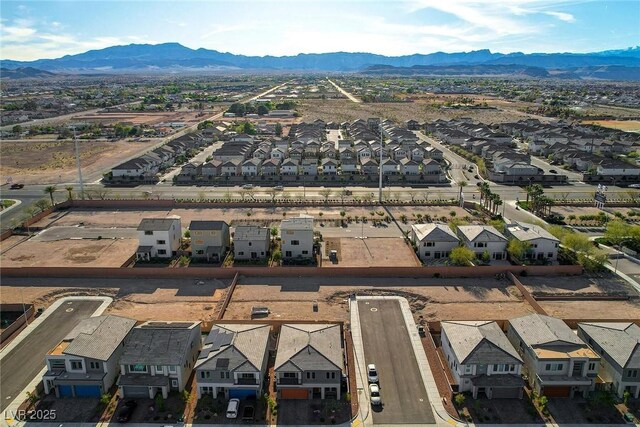 bird's eye view with a mountain view