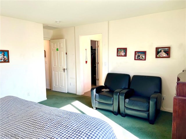 bedroom with dark colored carpet and a closet