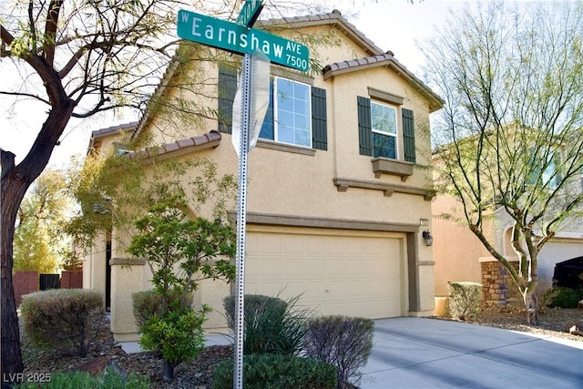 view of front of home with a garage