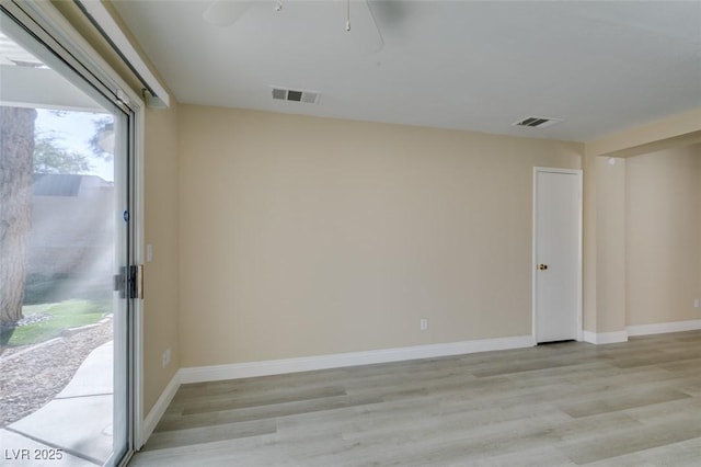 unfurnished room featuring light hardwood / wood-style floors and ceiling fan