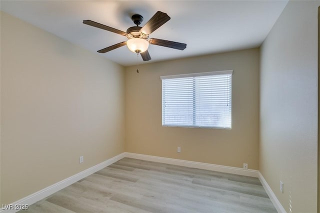 unfurnished room featuring light hardwood / wood-style floors and ceiling fan