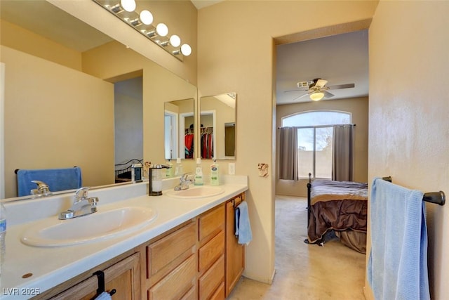 bathroom featuring vanity and ceiling fan