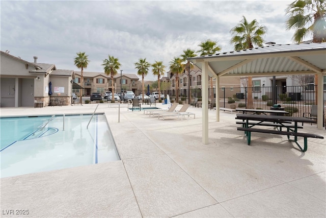 view of swimming pool with a gazebo and a patio