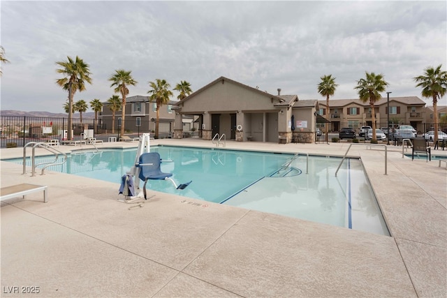 view of swimming pool with a patio