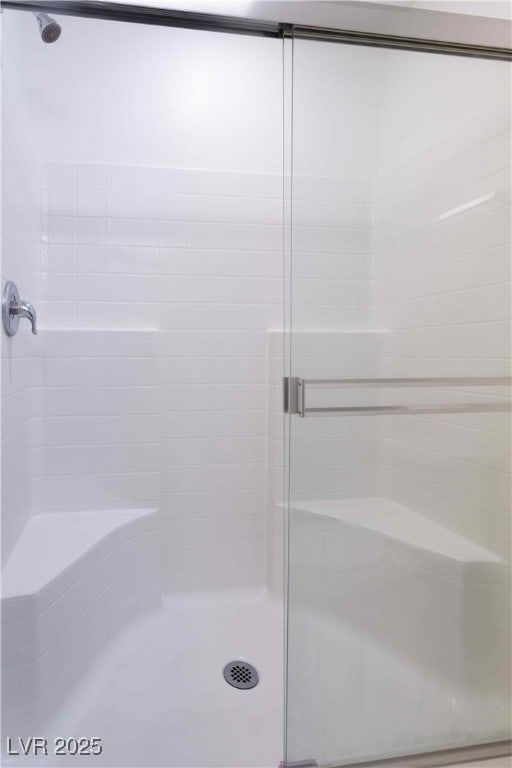 bathroom featuring walk in shower