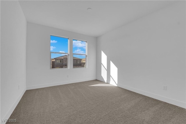 unfurnished room with carpet floors