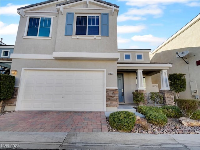 view of front of property with a garage